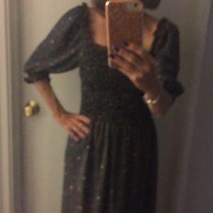 Peasant maxi dress, 95%polyester 5% rayon.